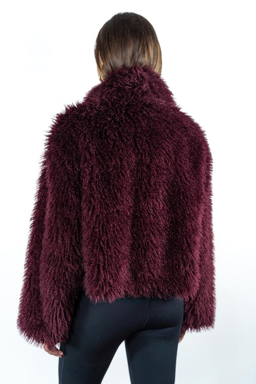 ECPELLICCIA CORTA FRISÈ  CON FRANGE