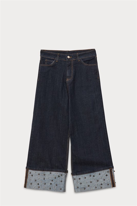 JEANS CON BORCHIE SUL FONDO