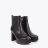 STIVALETTO CON PLAFORM E PLACCA