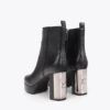 STIVALETTO CON PLAFORM E PLACCA